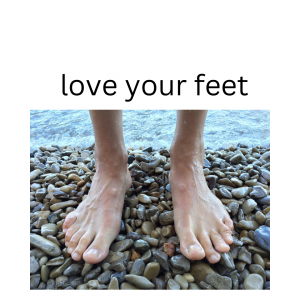 two feet on a pebbly beach
